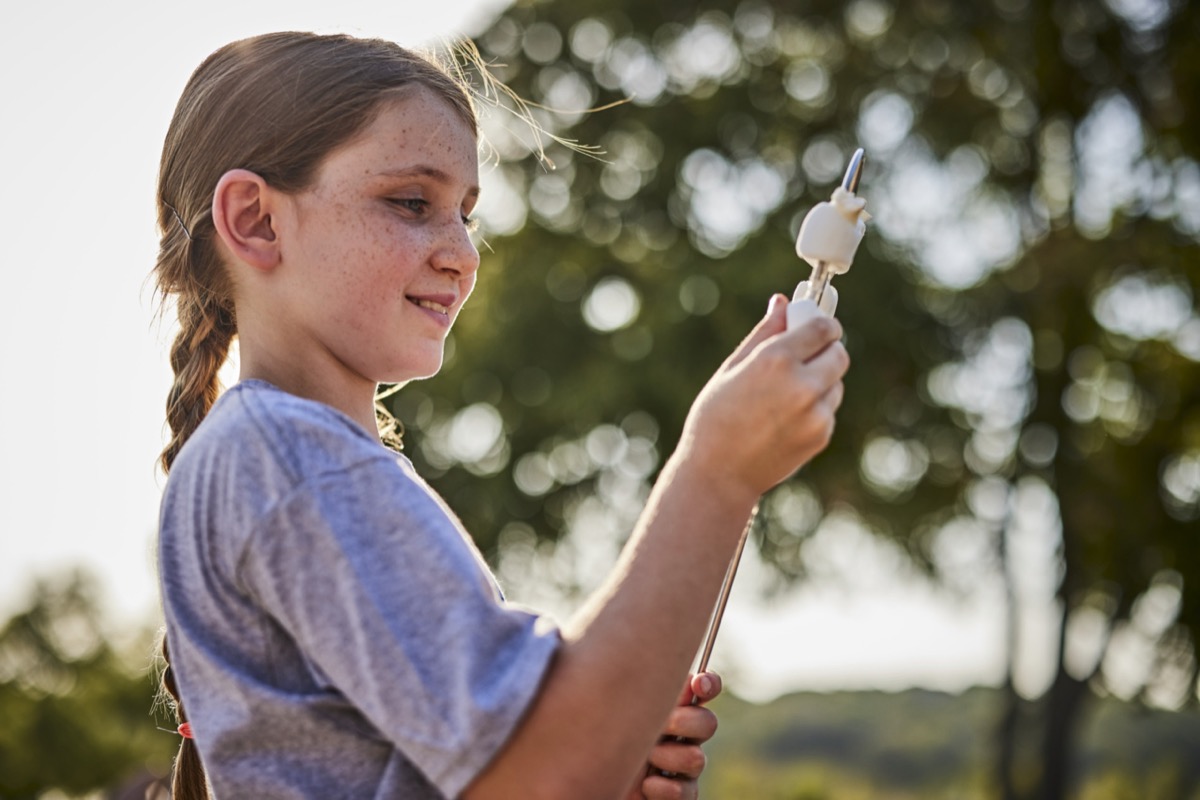Roasting a marshmallow at the campfire